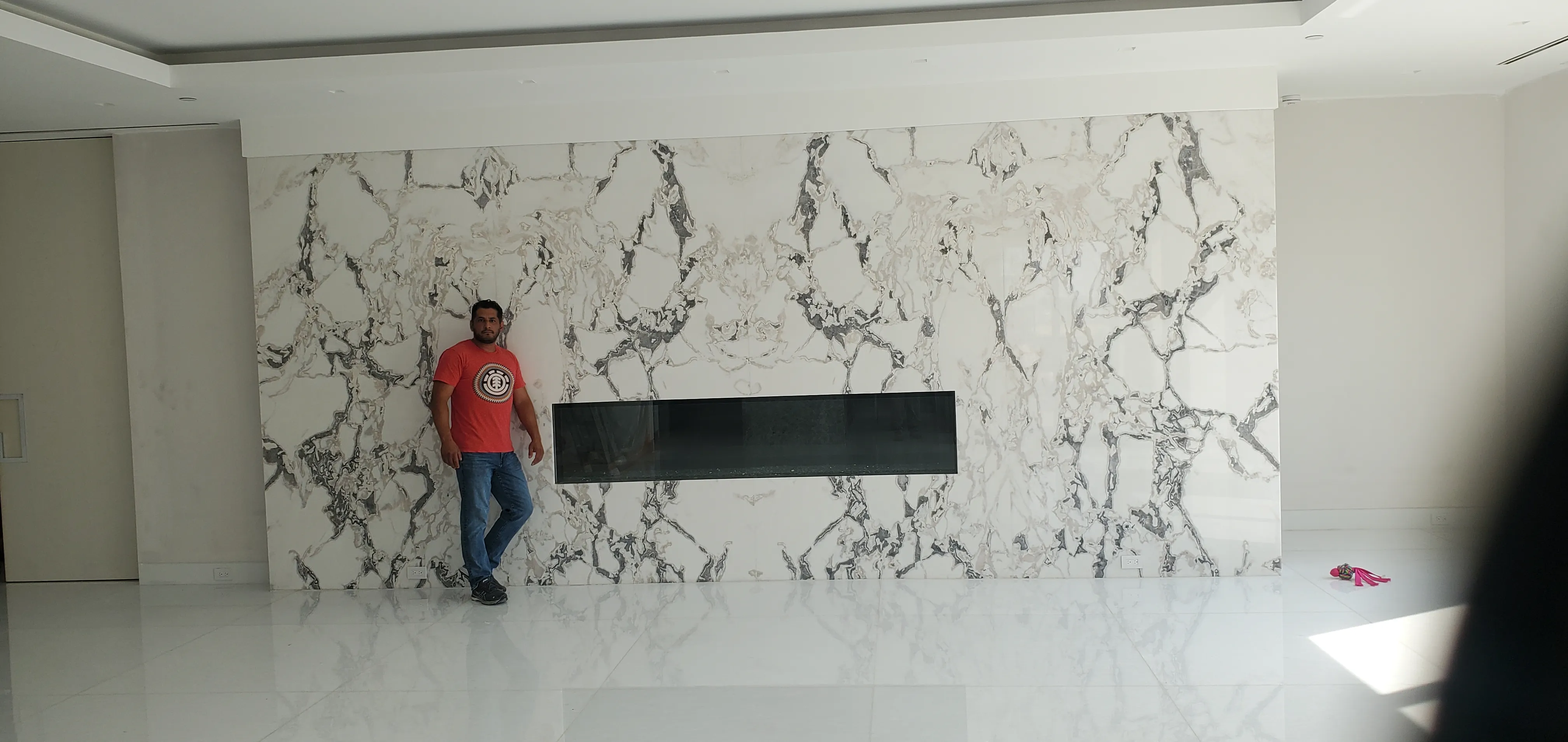 Lou on a recent marble linear gas fireplace install