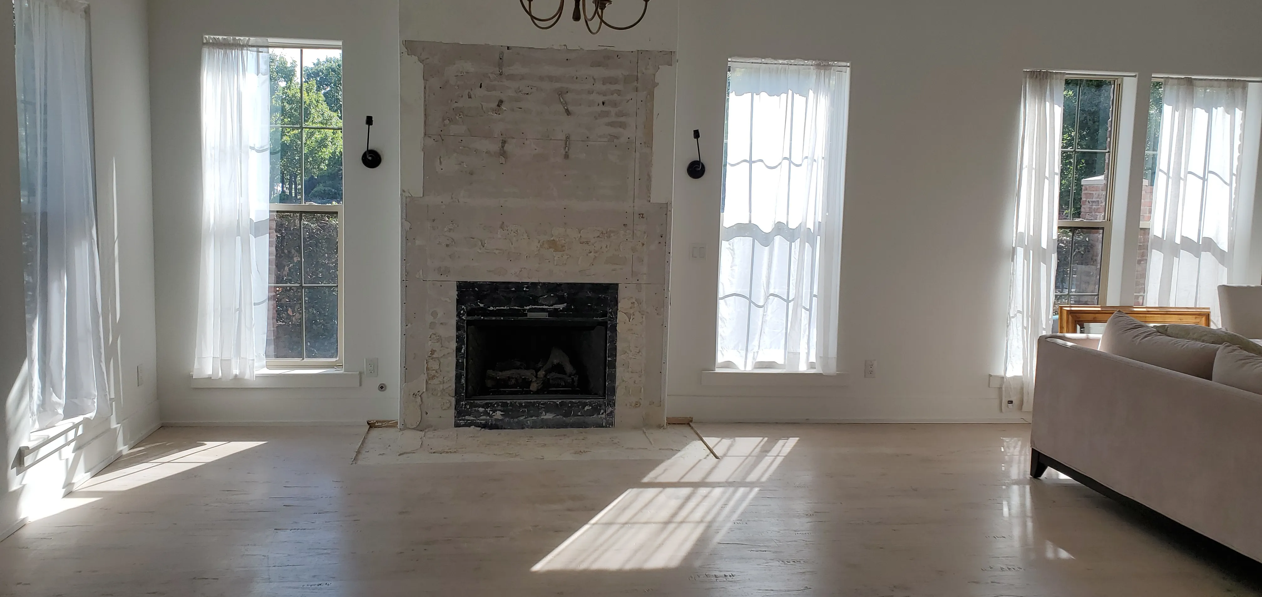 Existing stone mantel removed and relocated to the new house