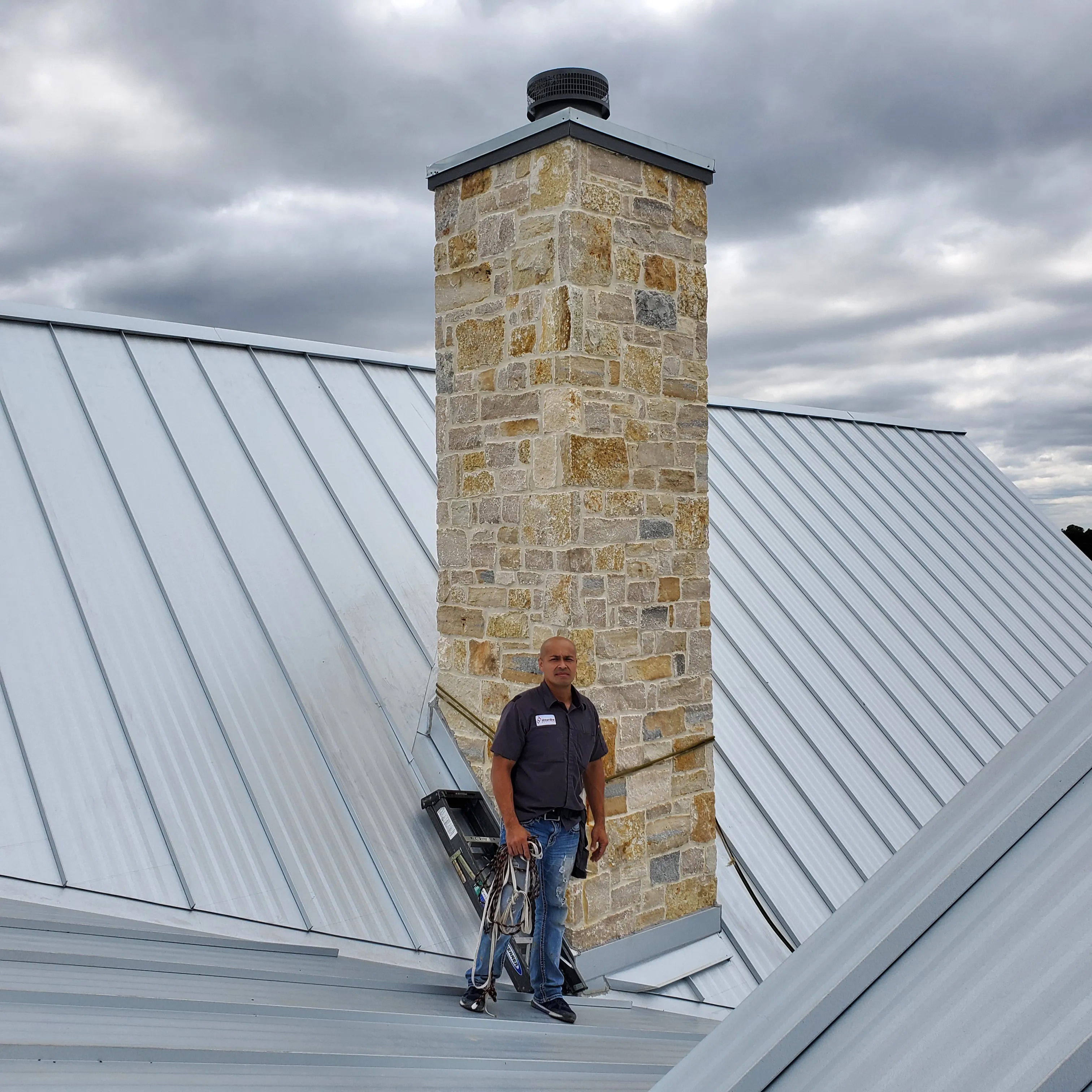 Roland San Lucas, senior fireplace installer at Chim-Tex Construction, on the Blue Jack National build in Hockley, TX