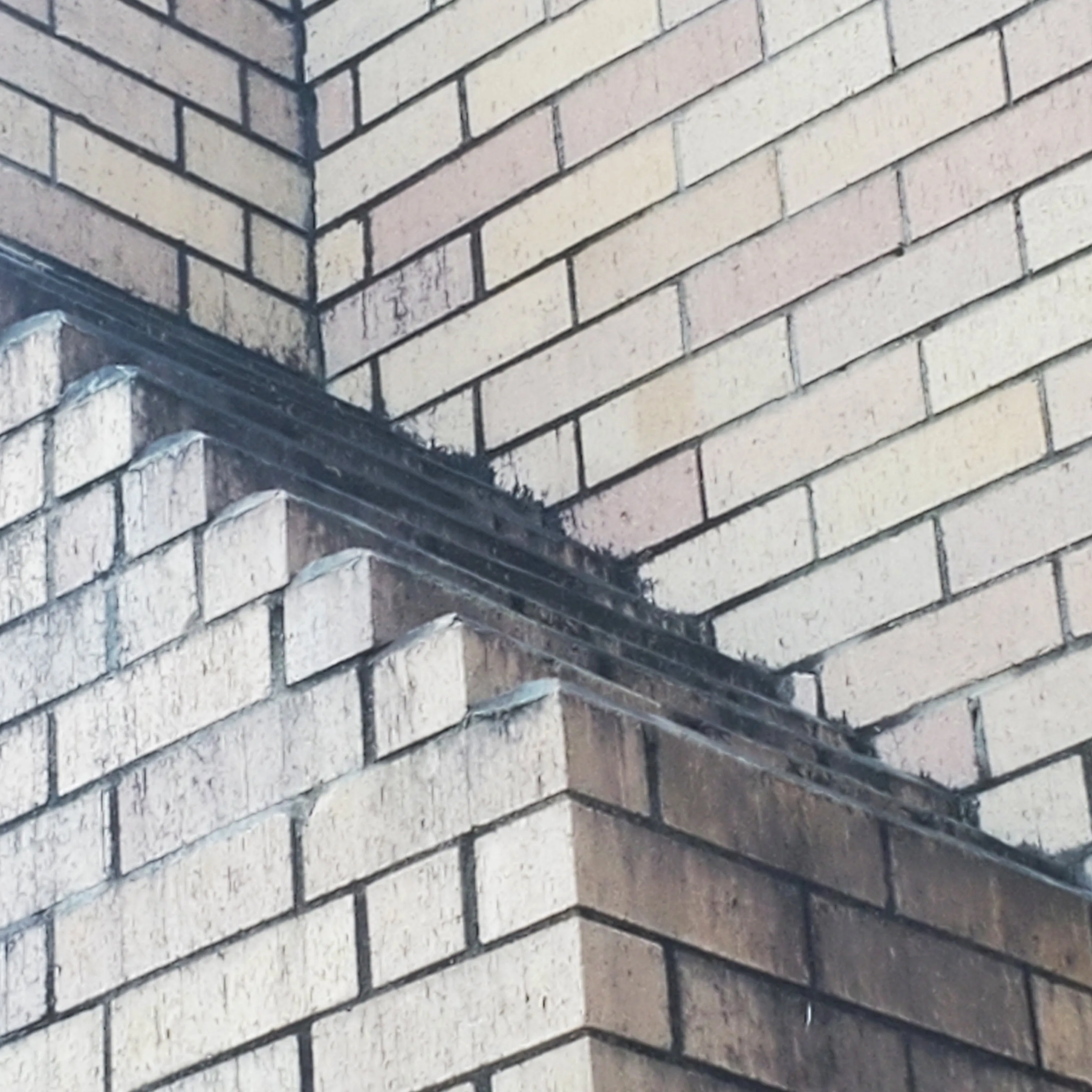 Detailed brick masonry corner on a Chim-Tex chimney install